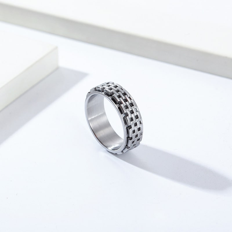 Bague anti-stress anneau tournant Muraille en coloris argenté.