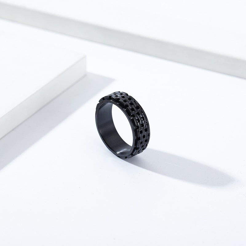 Bague anti-stress anneau tournant Muraille en coloris noir.