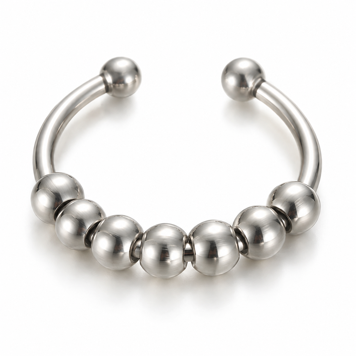 Bague anti-stress bille Demi-Cercle en coloris argenté.