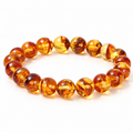 Bracelet Ambre Cire d'Abeille, perles rondes d’ambre couleur miel à inclusions