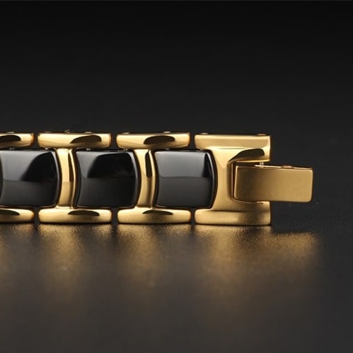 Bracelet magnétique Quilus, maillons dorés incrustés de plaques noires