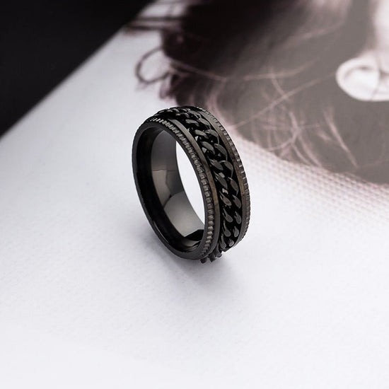 Bague anti-stress à anneau tournant Blackchaine couleur noire.