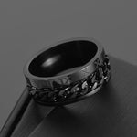 Bague anti-stress à anneau tournant Chaine Chiffrée couleur noir.
